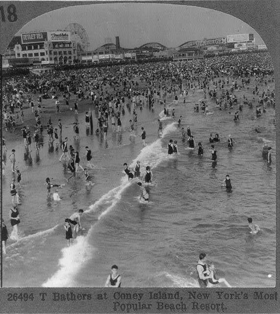 Bathers at Coney Island, with Stauch's baths visible in the back.