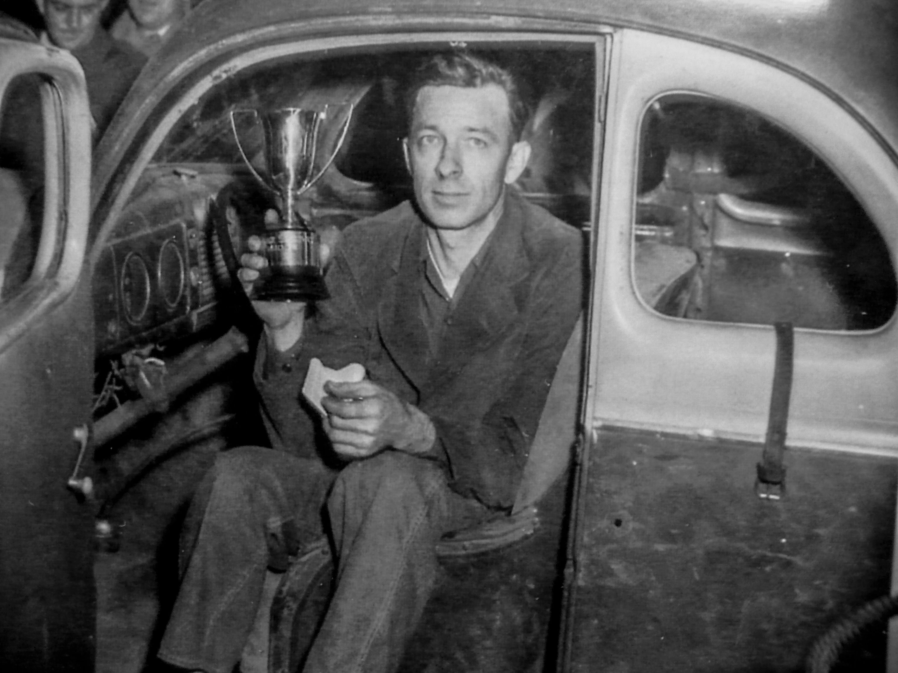 Bill Blair poses as the winner at Butner Race Track, Camp Butner, North Carolina.