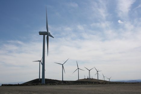 Silhouetted turbines.