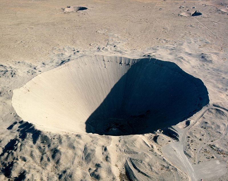 Crater from the 1962 "Sedan" nuclear test as part of Operation Plowshare. The 104 kiloton blast displaced 12 million tons of earth and created a crater 320 feet deep and 1,280 feet wide. 