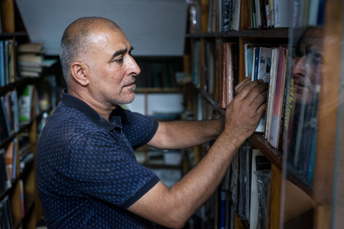 "People made me brave," Daud Salim says of his decision to reopen Maktaba al-Sham on Najafi Street. "They told me to go back, go back, go back.”