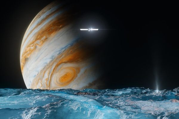 An artist’s rendering of NASA’s Europa Clipper passing over the ice-covered moon Europa as it orbits Jupiter. The spacecraft is scheduled to reach Jupiter in 2030.