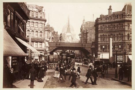 A line forms on the left for the King Lud pub in Ludgate Circus, London, c 1890.