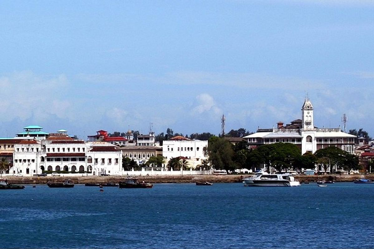 The palace (Bait As-Sahel) from Zanzibar's harbor, to the left of the city's iconic House of Wonders.