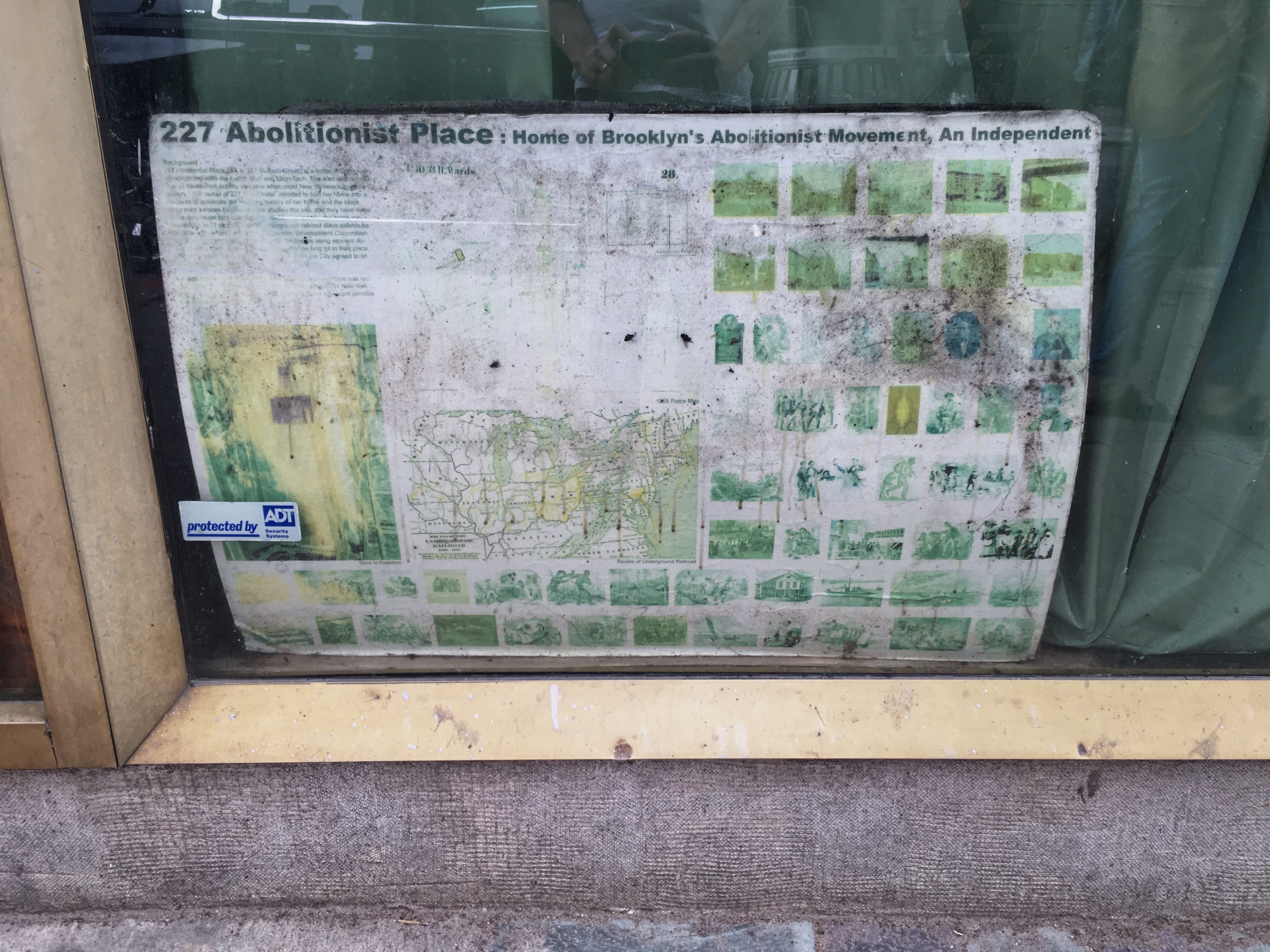 In the window of 227 Duffield Street is a makeshift gallery about the area's role in anti-slavery movements.