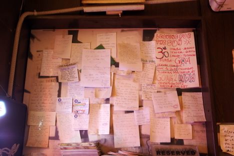 A bulletin board at the Pudding Shop.