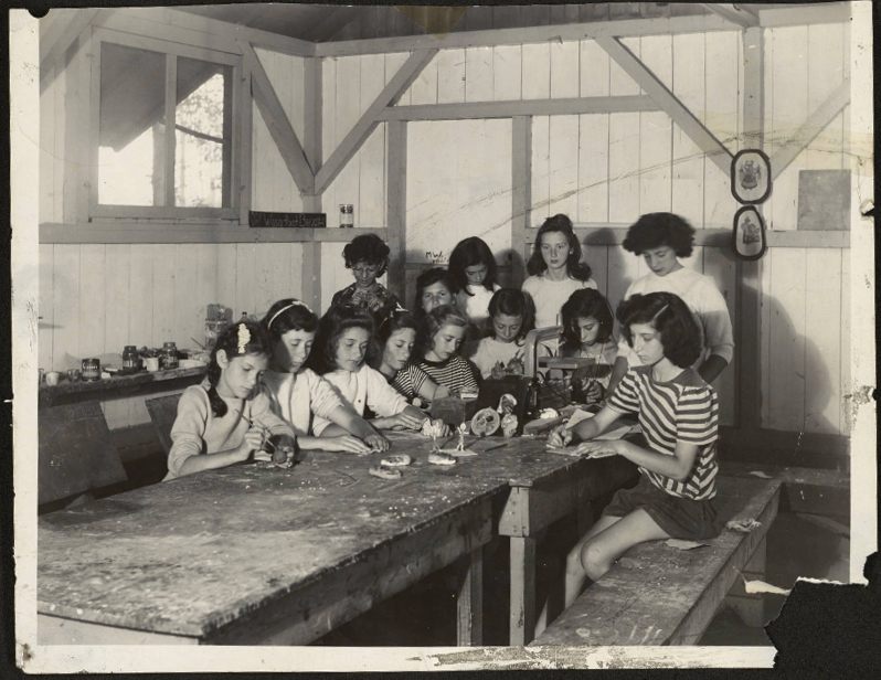 Girls working in the wood and clay shop, c. 1946. 