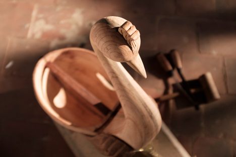 A work in progress: Carved from a single block of wood, the harp-like yazh features a distinctive peacock head.