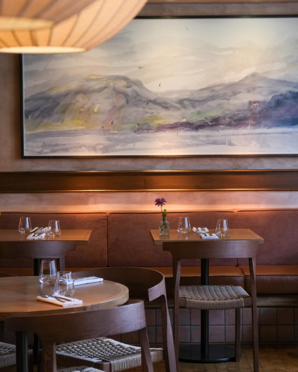 A watercolor by Norman Ackroyd hangs on the wall at Lolo.