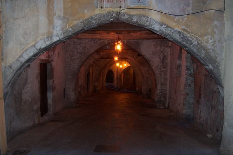 A view of the street and its arches.