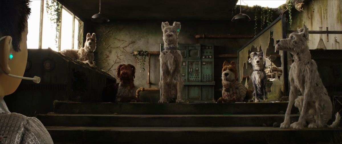 The dogs meet in the abandoned animal testing facility on Trash Island.
