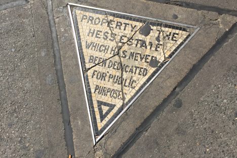 Stand on the tiniest, angriest piece of private property in the city.