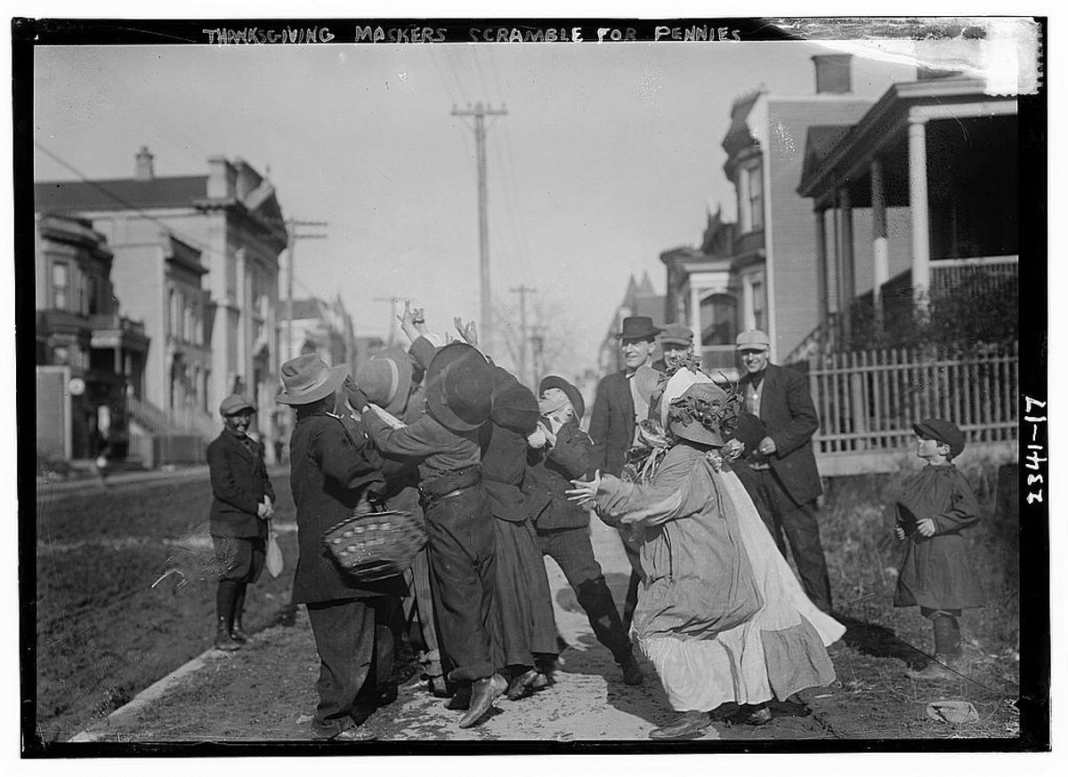 Masked "ragamuffins" compete for pennies.