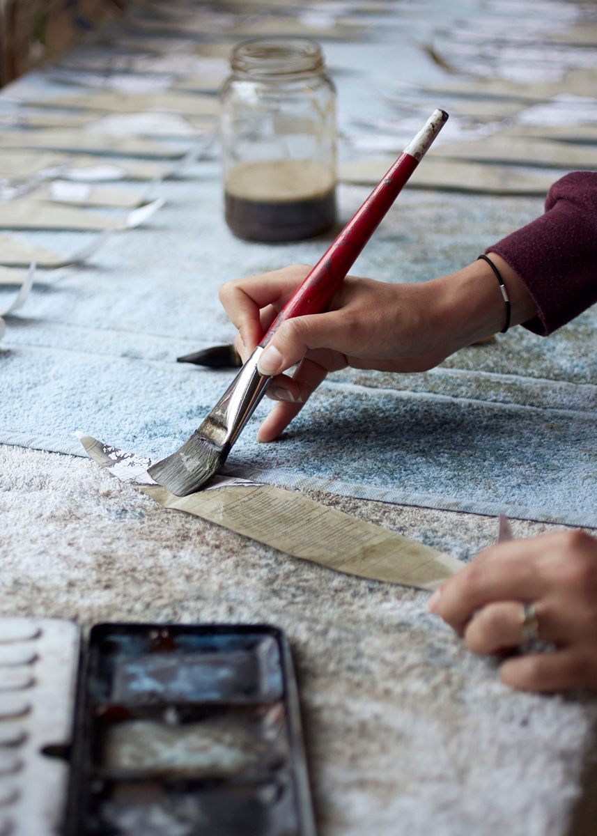 Painting the first layer of pigment / watercolours on gores, once applied many more layers will be added, photo by Tom Bunning.
