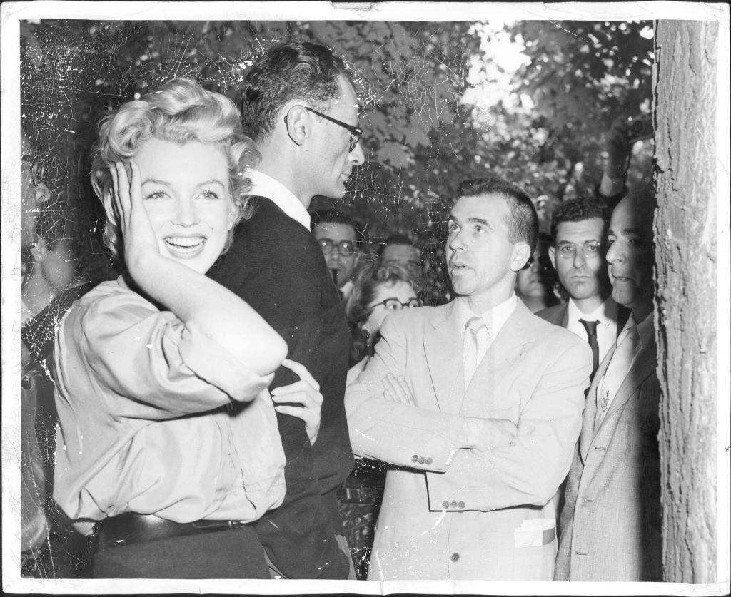 Marilyn Monroe and Arthur Miller speaking with reporters, 1956. 