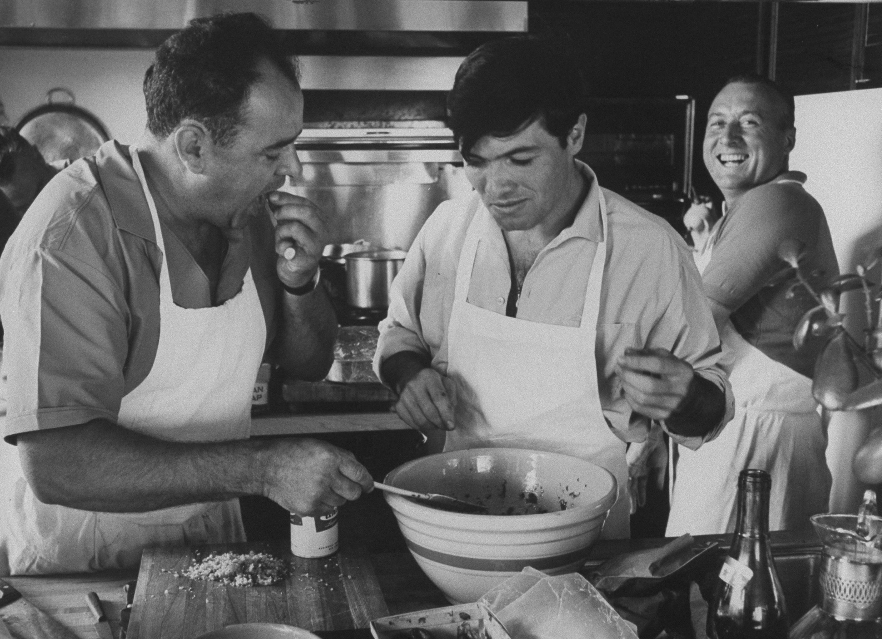 Whilte House Chef René Verdon (left) and former chef Jacques Pepin preparing a salad for a picnic on Gardiners Island.