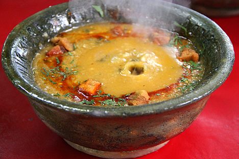 A steaming bowl of k’alapurka, right after the stone was dropped inside.