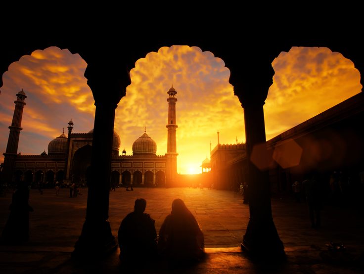 The sun sets behind Jama Masjid