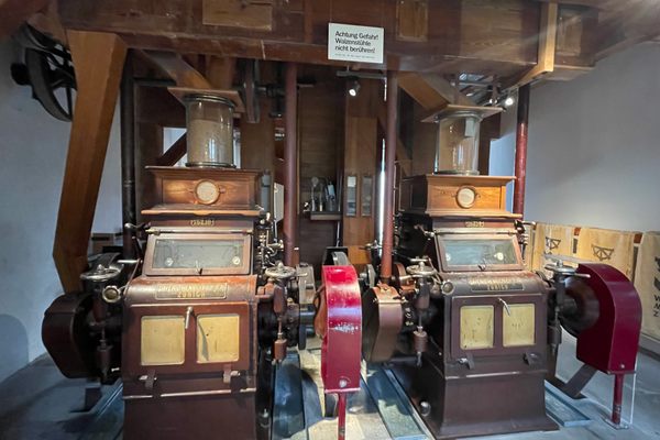 Mill machinery is on display.