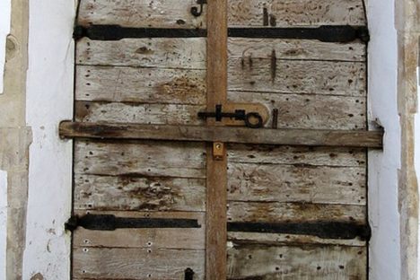 The 15th C. north door with scorch marks, some say left by the Devil's hand, Holy Trinity Church, Blythburgh.
