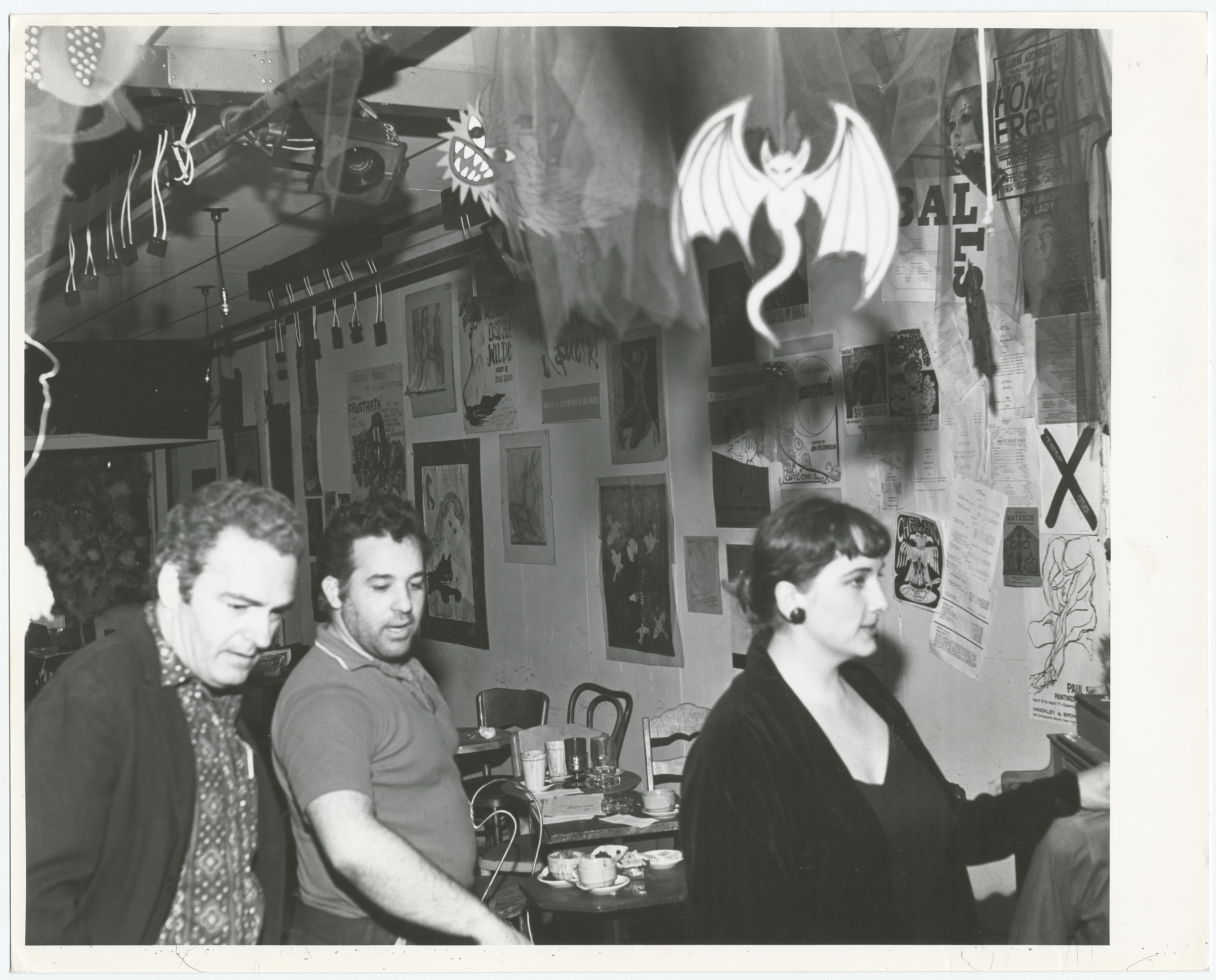 Joe Cino, middle, in the re-opened Caffe Cino, some months after a 1965 fire.