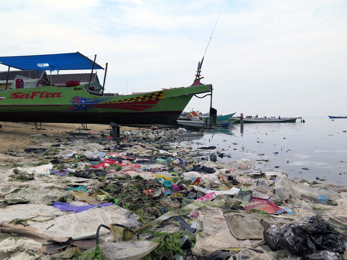 Plastic debris piled up on the beach of the Indonesian island of Sulawesi.