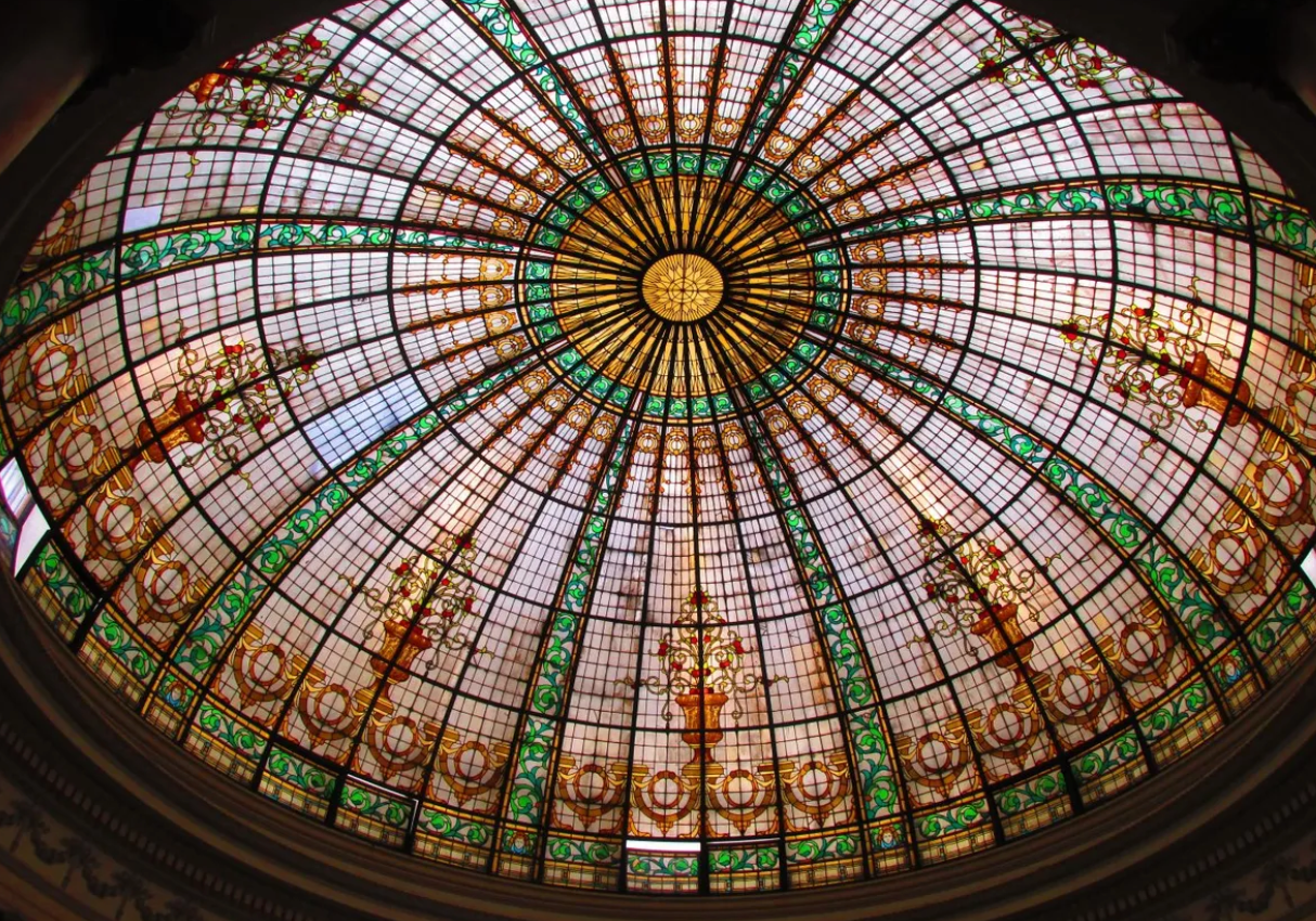 The stained glass dome over the lobby was designed by Peruvian architect Rafael Marquina.