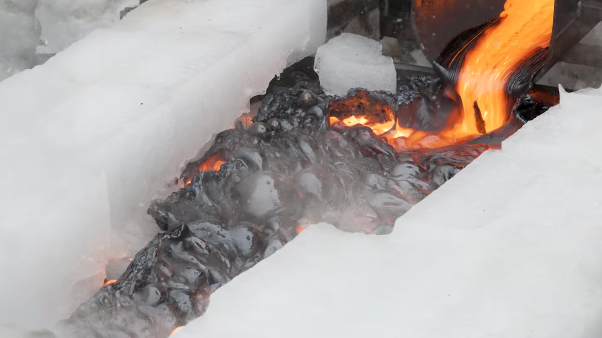 A still from a video by volcanologist Ben Edwards, lead author of the 2013 <em>Geology</em> paper, shows bubbles rising to the surface of lava as it travels across ice. The bubbles cool into beautiful but fragile domes of obsidian.