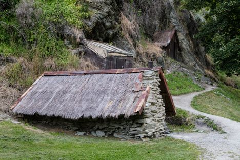Modest huts dot the edge of town.