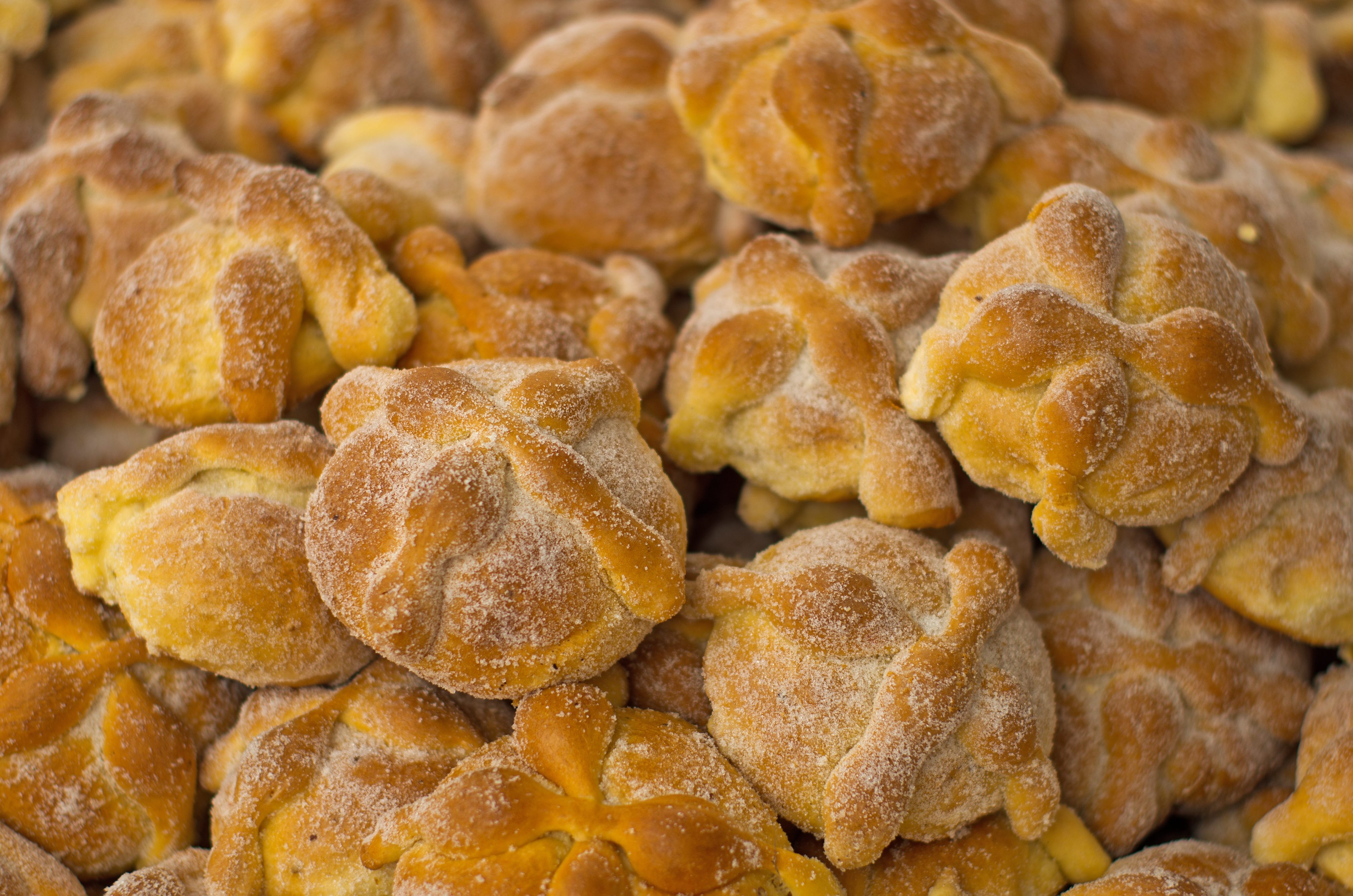 Pan de muerto for sale at market.