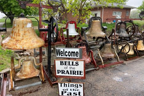 Sign and left side of the collection of bells