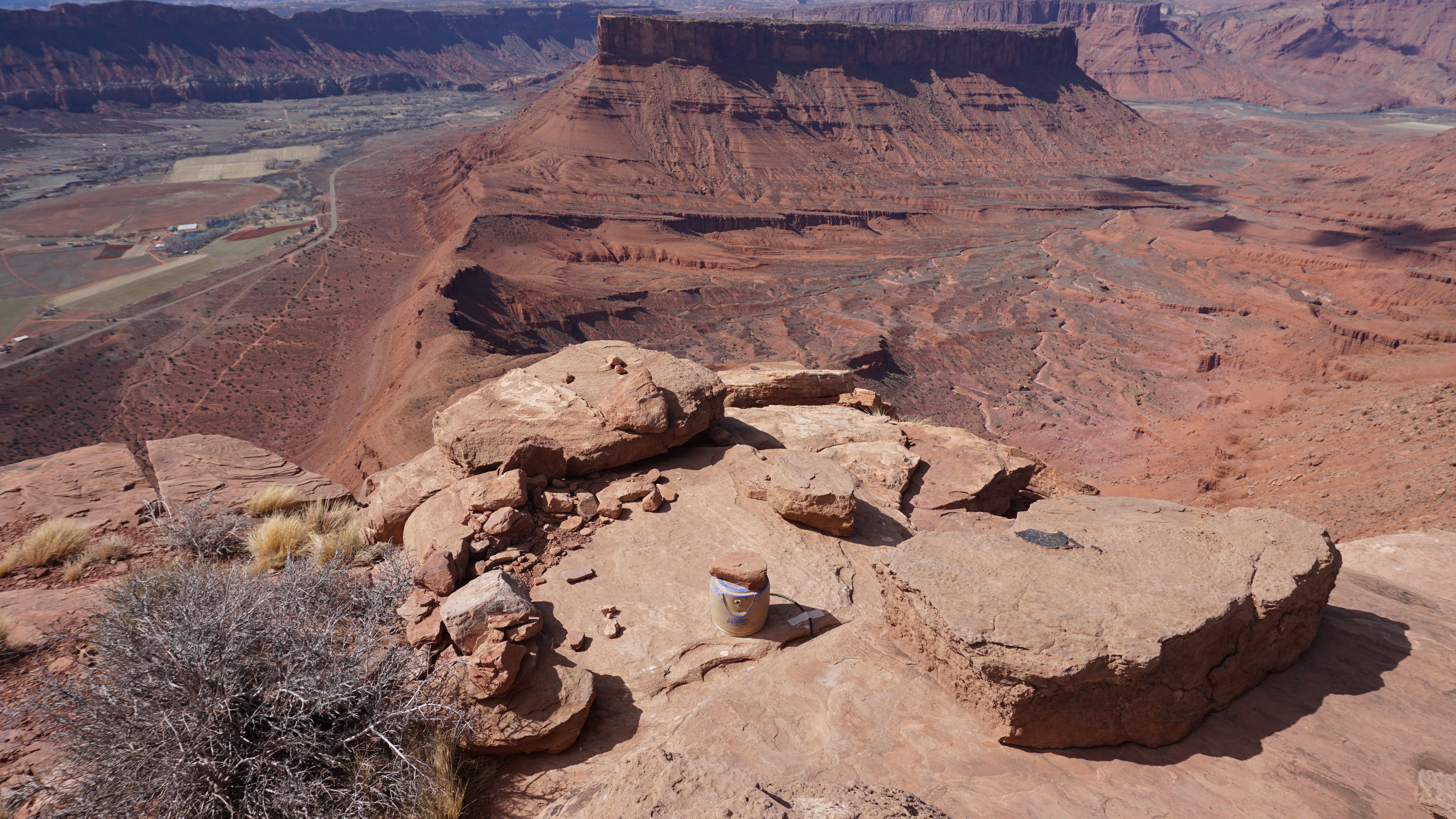 The seismometer, protected from the wind and sun in an insulated bucket, measures the mountain.