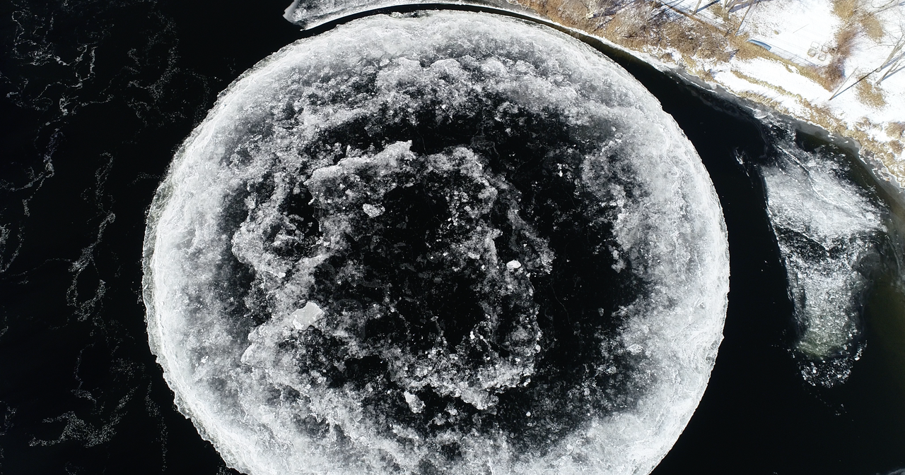 A vertical vortex has set the disk spinning.