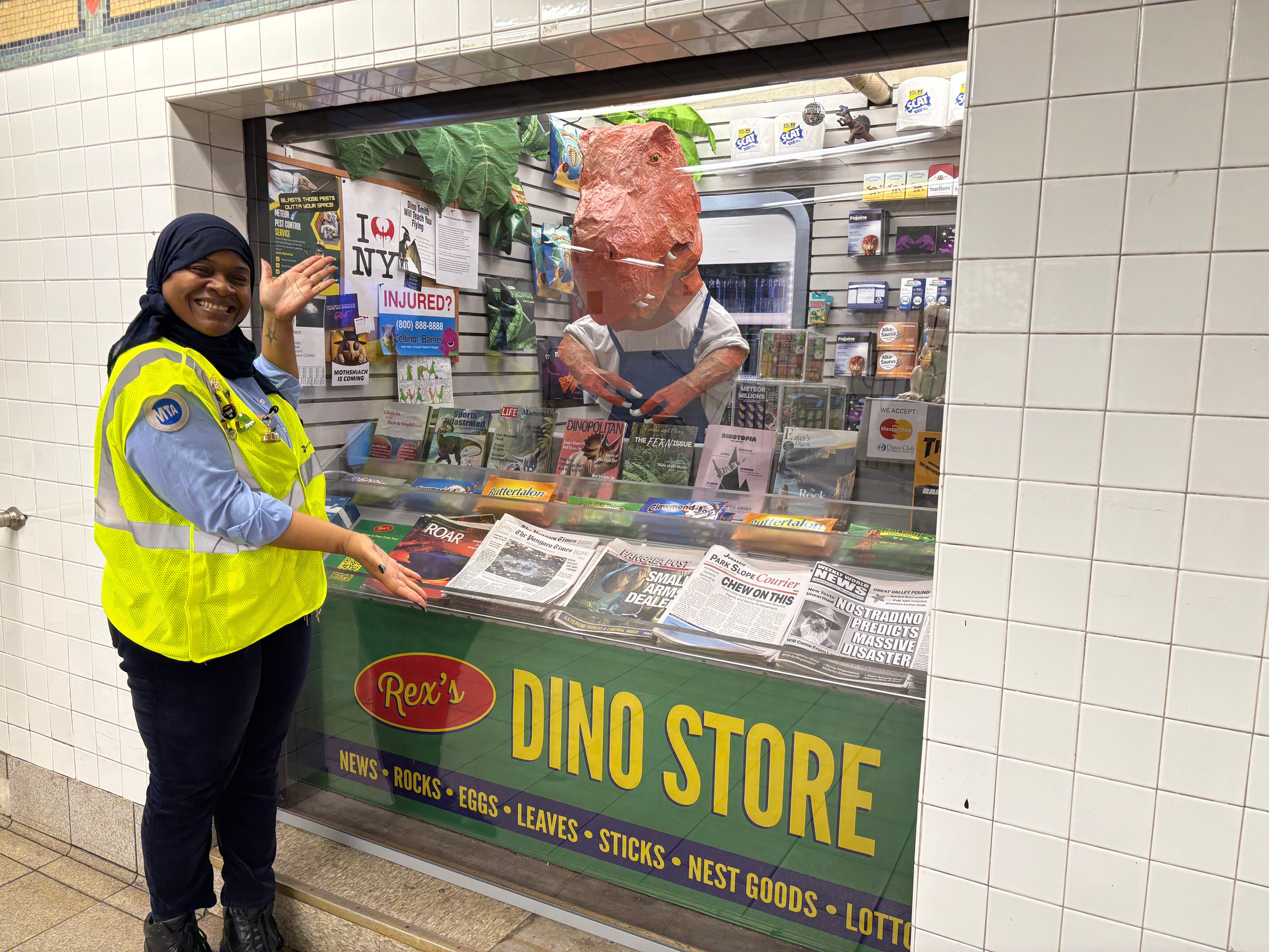 Station attendant Marjorie Nassirou proudly shows off the store to passing commuters.