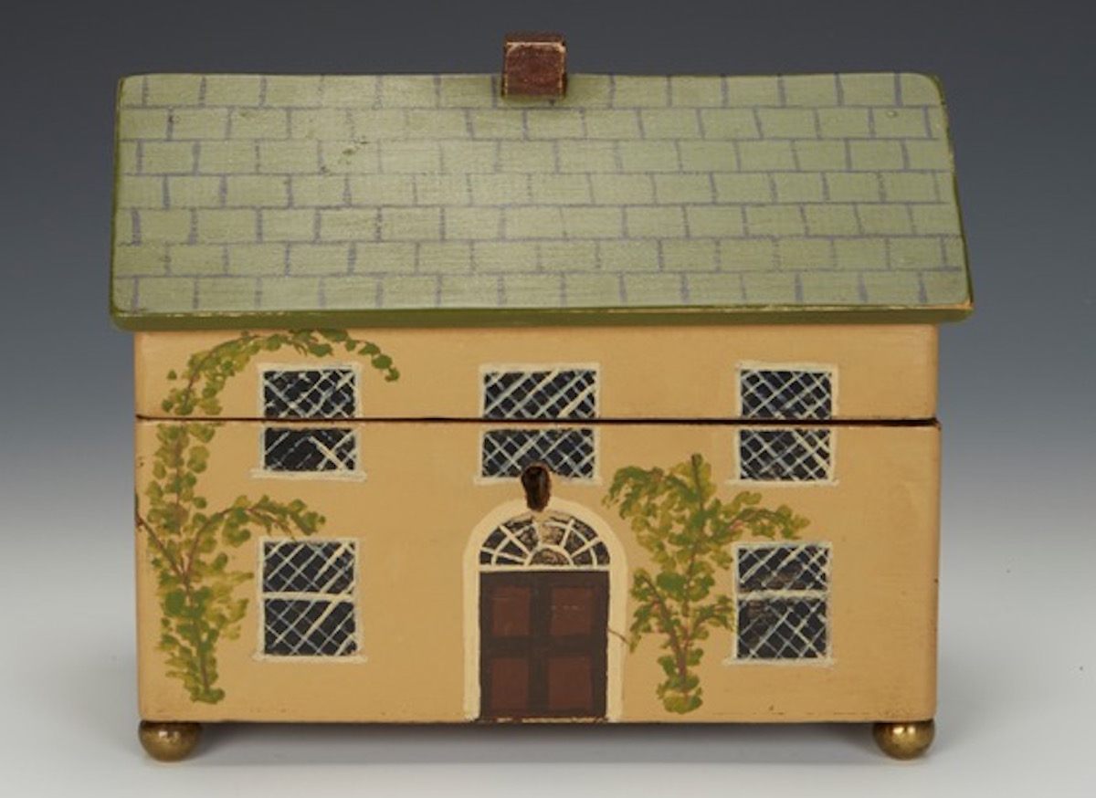 Regency-period cottage tea caddy.