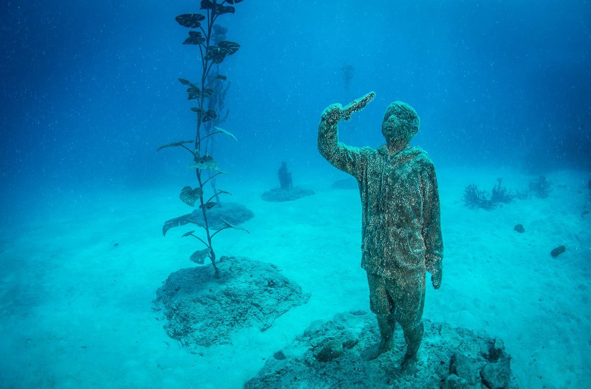 The “Ocean Siren” is the only sculpture visible above the surface. The other installations—including this one—are made of marine-grade concrete and anchored to the seabed.