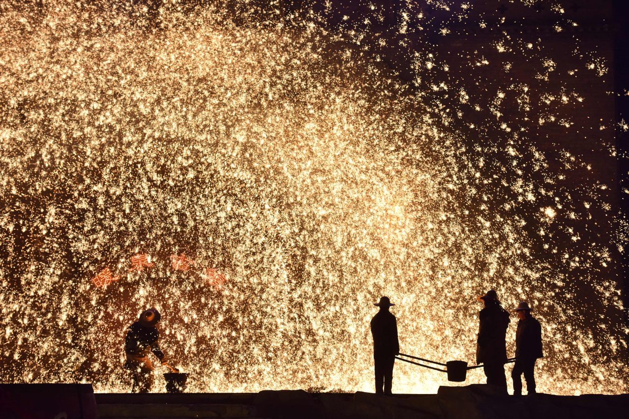 In Nuanquan, a town in China’s Hebei province, the Lunar New Year is marked with a pyrotechnic display created by throwing molten metal against a wall.