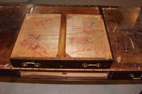 The desk drawer covered in haiku. 