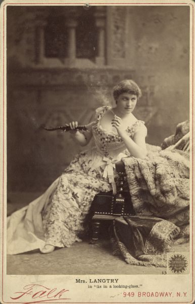 Lillie Langtry in character as the adventuress Lena Despard from the 1887 play <em>As in a Looking-Glass</em>.