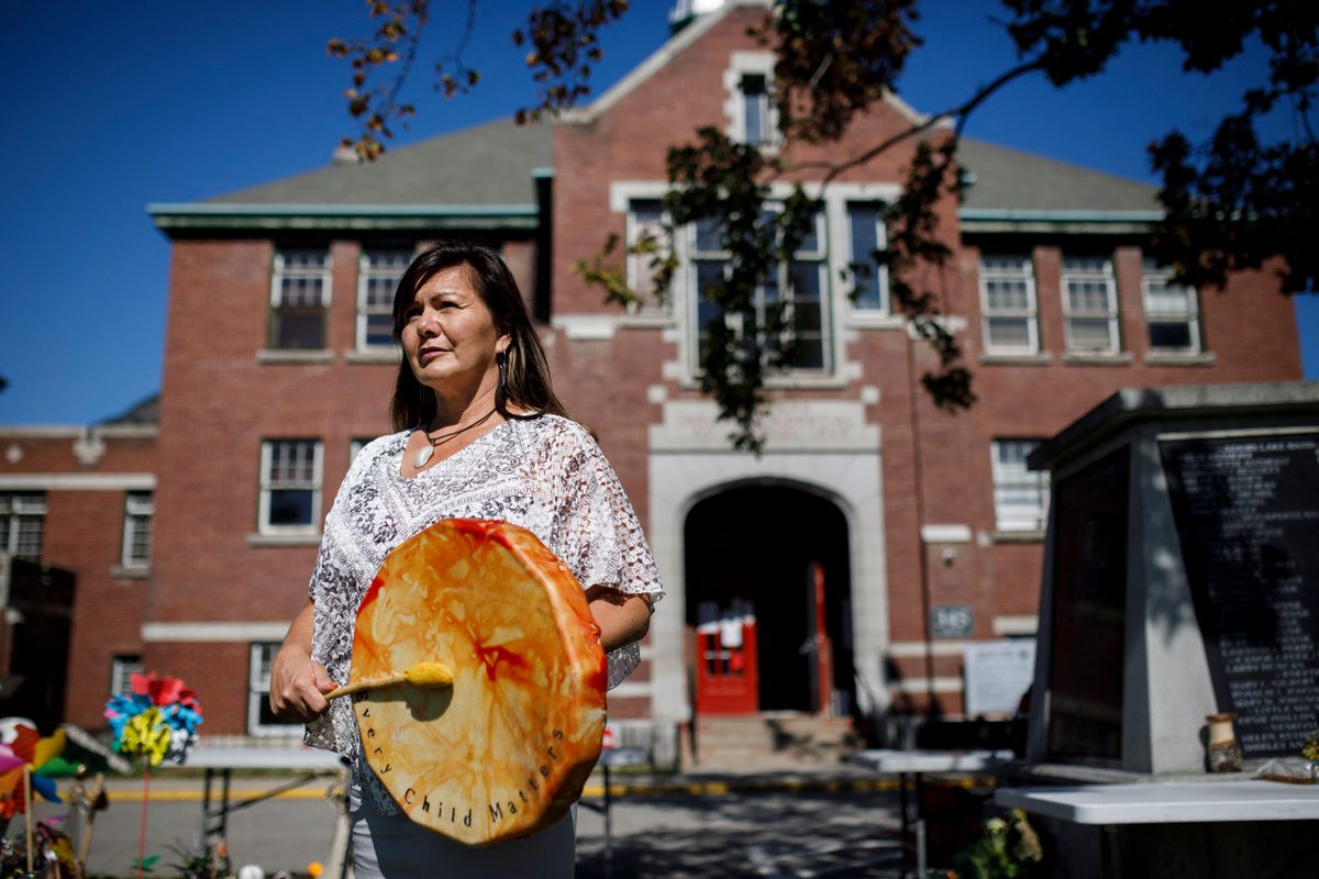 Rosanne Casimir, the Tk’emlúps te Secwépemc chief, at the site of a makeshift memorial at the former Kamloops Indian Residential School in 2021.