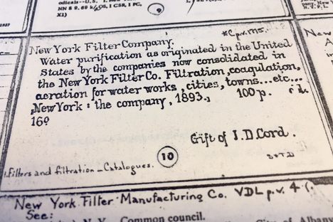Fancy handwriting on a catalog card from the New York Public Library.
