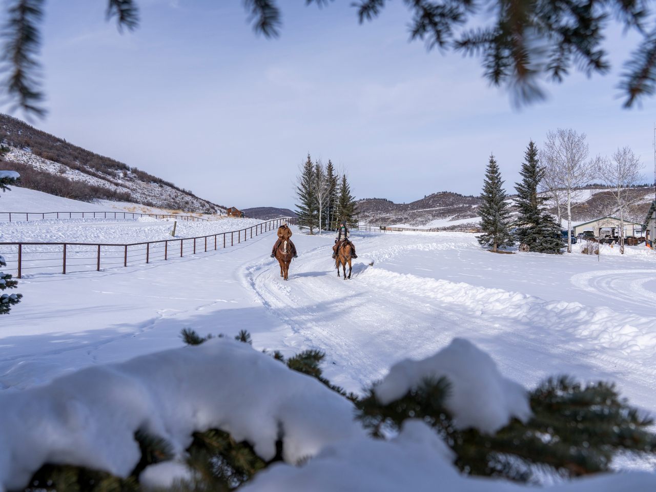 Enjoy stunning winter vistas on horseback at Saddleback Ranch