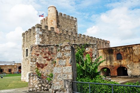 The fortress is often overgrown with lush vegetation.