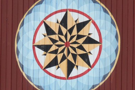 Prolific barn star artist Milton J. Hill created this signature design, which is featured on the tour. 