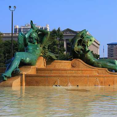 Sculpted figures lounge in the Swann Memorial Fountain