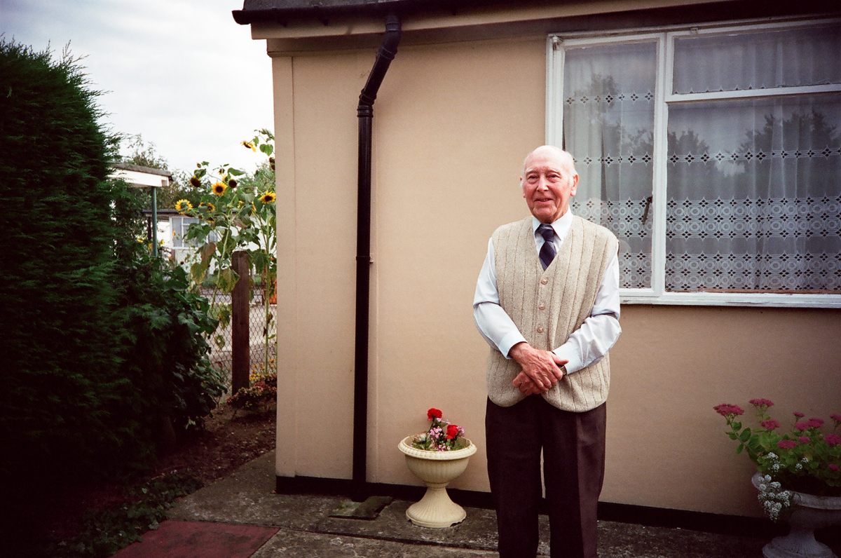Eddie O'Mahony in front of his prefab, Excalibur Estate, 2003.