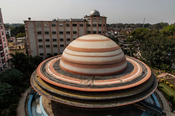 The planetarium's Saturn-shaped building measures nearly 70 feet in diameter.