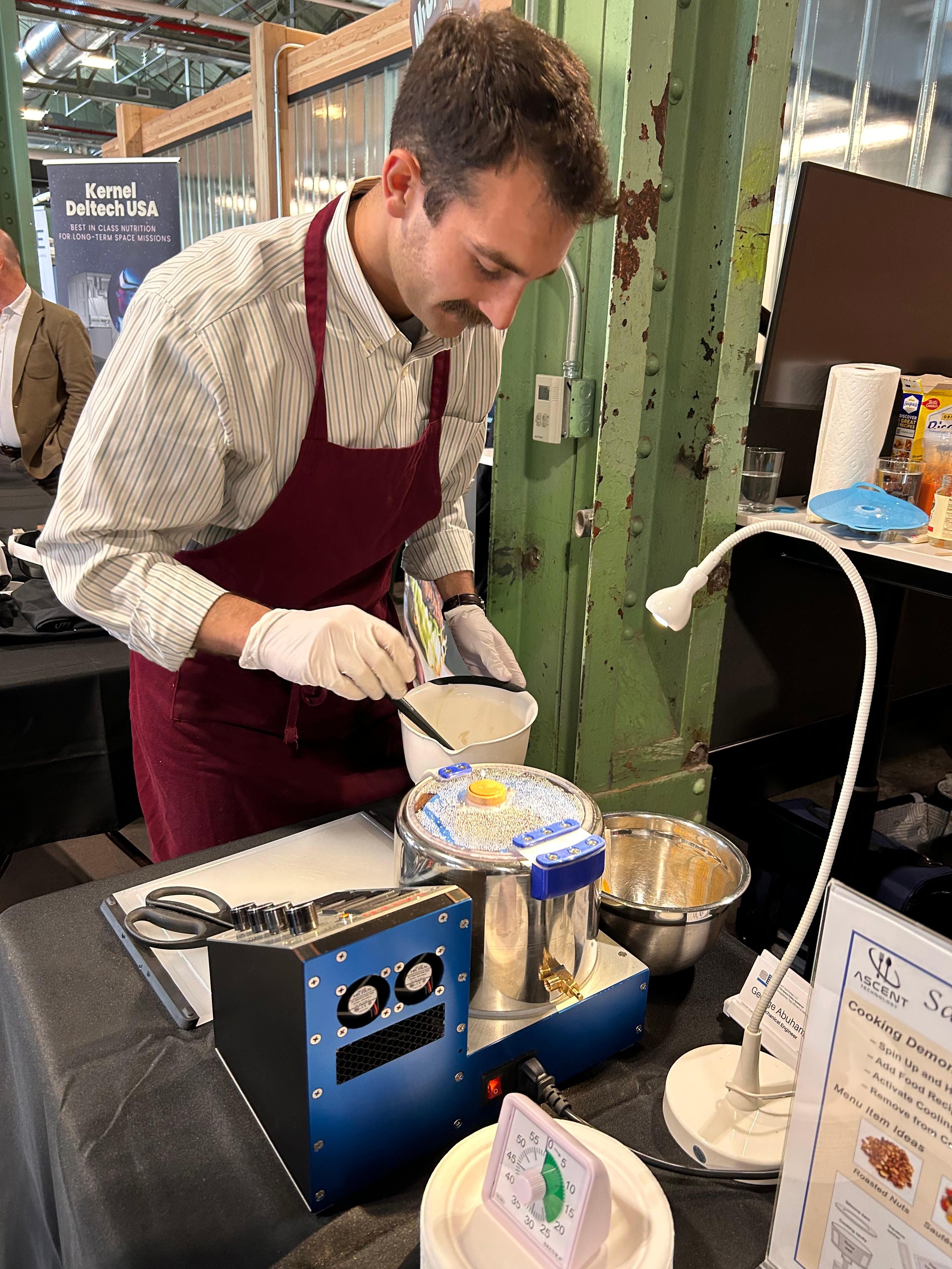 An engineer for Jim Sears's company cooks up a meal using SATED at the Brooklyn Navy Yard.