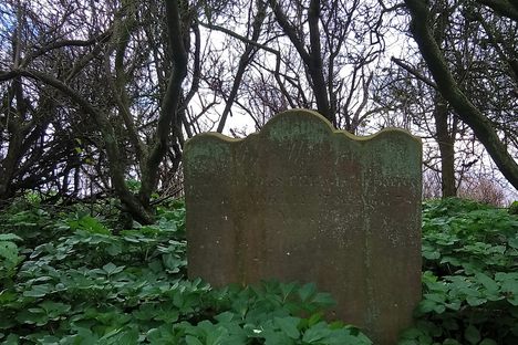 The grave stone.