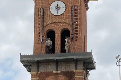 The two cowboys at Grapevine Glockenspiel Tower.
